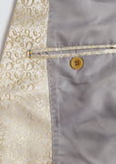 Beige suit with vest and pants on a mannequin against a white background