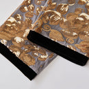 Pantalon homme brillant brodé de luxe gris doré