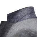 Traje gris de tres piezas a cuadros con dos botones para hombre