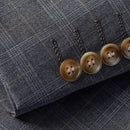 Traje gris de tres piezas a cuadros con dos botones para hombre